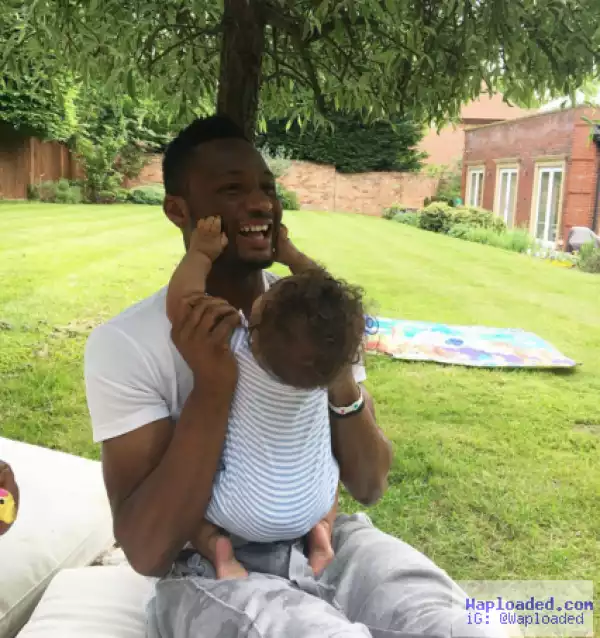 Adorable photo of Mikel Obi with one of his twin girls